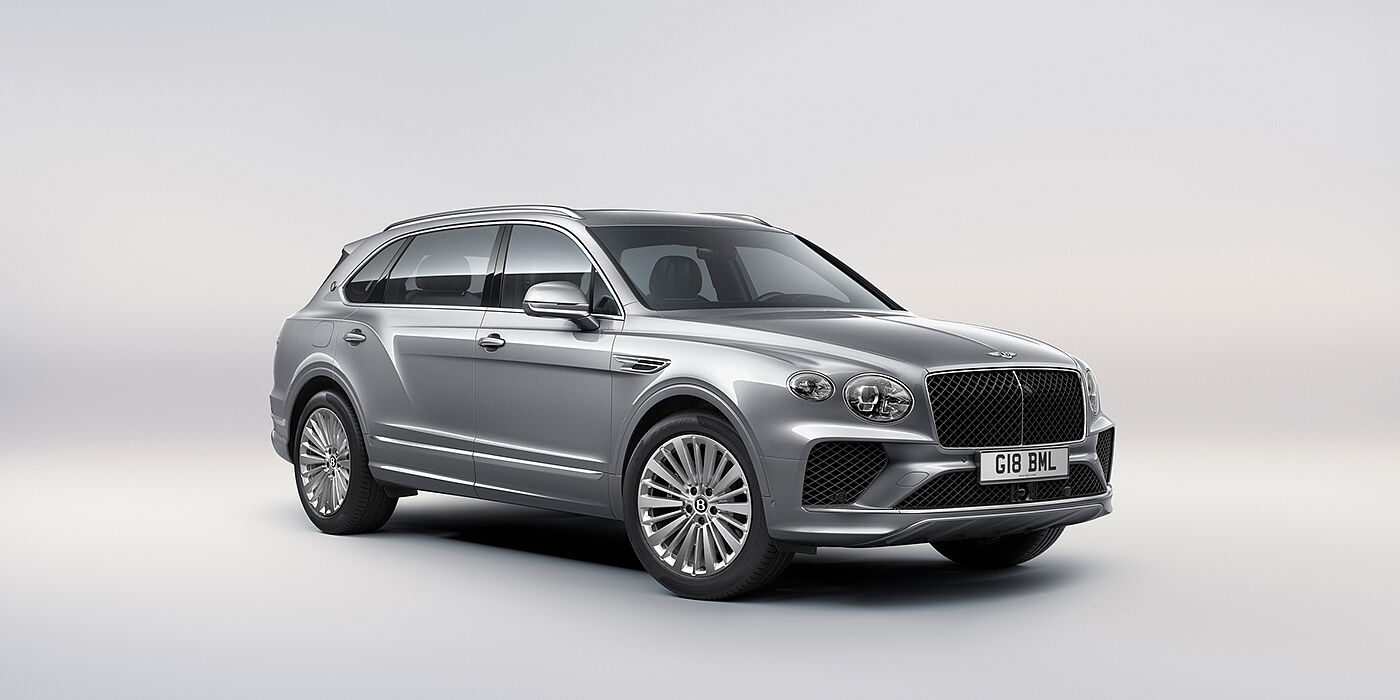 Bentley Luxembourg Bentley Bentayga Extended Wheelbase luxury SUV front three quarter view in Moonbeam paint with 21 inch five spoke painted wheels