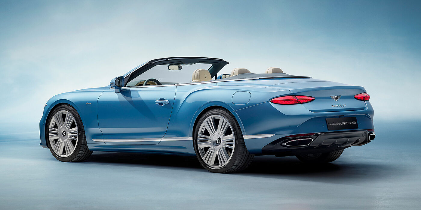 Bentley Luxembourg New Bentley Continental GTC Azure convertible rear view in Light Windsor blue paint with 22 inch ten spoke wheels and chrome exterior details